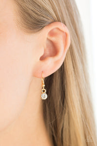 Special Treatment - Gold Necklace With White Rhinestones - Paparazzi Accessories - All That Sparkles XOXO