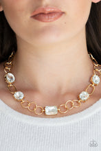 Load image into Gallery viewer, Urban District - Gold and White Rhinestone Necklace - Paparazzi Accessories - All That Sparkles XOXO
