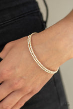 Load image into Gallery viewer, Sleek Sparkle - Gold, White Rhinestone Coil Bracelet - Paparazzi Accessories