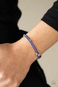 Let Freedom BLING - Blue Rhinestone and Star Coil Bracelet - Paparazzi Accessories
